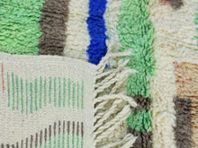 Load image into Gallery viewer, Colorful Moroccan rug featuring artistic lines and natural wool texture

