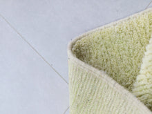 Load image into Gallery viewer, Moroccan handmade rug with yellow geometric motif and natural fringe


