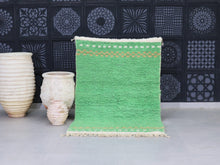 Load image into Gallery viewer, Handmade Moroccan green wool rug with tribal design and orange-white border


