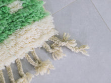 Load image into Gallery viewer, Eco-friendly handmade wool rug in green with ethnic pattern details



