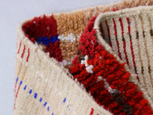 Load image into Gallery viewer, Narrow red wool rug with tribal flair


