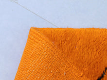 Load image into Gallery viewer, Vibrant beni ourain rug styled with pottery decor


