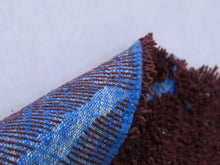 Load image into Gallery viewer, Plush Berber wool area rug in deep red with blue design


