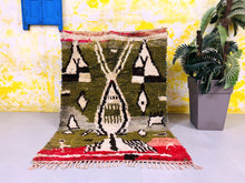 Load image into Gallery viewer, Unique Moroccan wool rug, handcrafted with care, featuring a blend of Beni Ourain tradition and modern aesthetic, versatile for various home styles.
