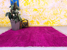 Load image into Gallery viewer, Authentic pink Beni Ourain rug with a soft, hand-knotted wool pile, bringing traditional Moroccan elegance to any bedroom setting.
