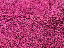 Load image into Gallery viewer, Chic pink Berber wool rug, handmade and washable, perfect for adding a pop of color to modern or traditional spaces
