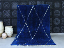 Load image into Gallery viewer, Handwoven blue Moroccan wool rug with white diamond lattice design.
