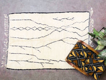 Load image into Gallery viewer, Plush Moroccan Beni Ourain rug with bold geometric designs, ideal for adding warmth to interiors
